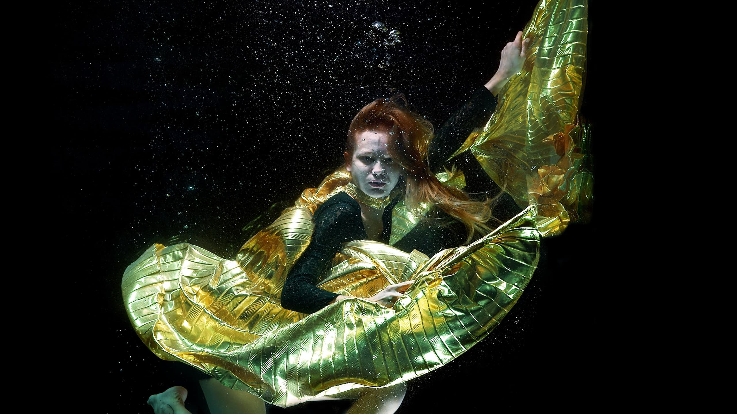 Woman swimming underwater