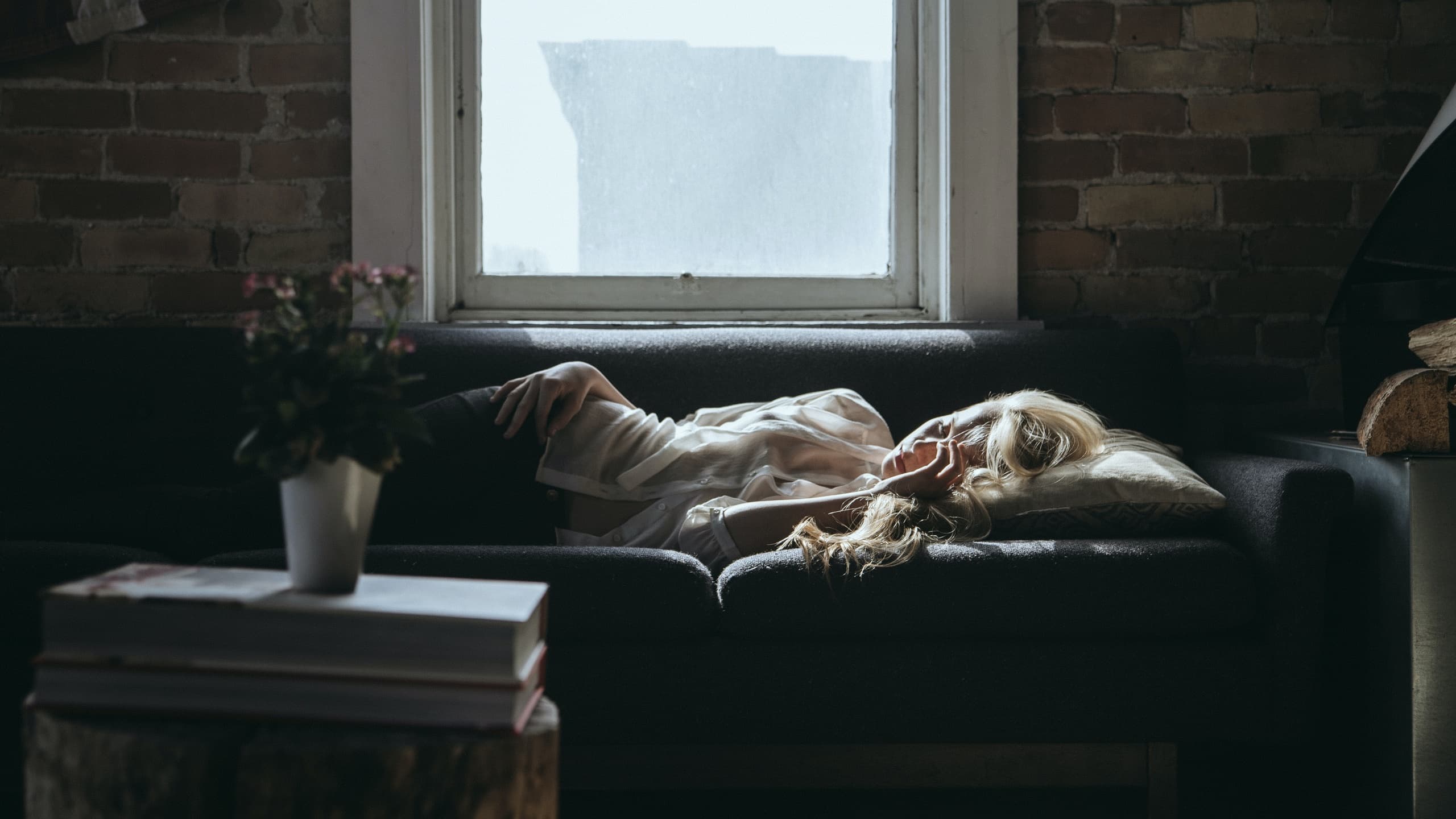 Woman sleeping on couch