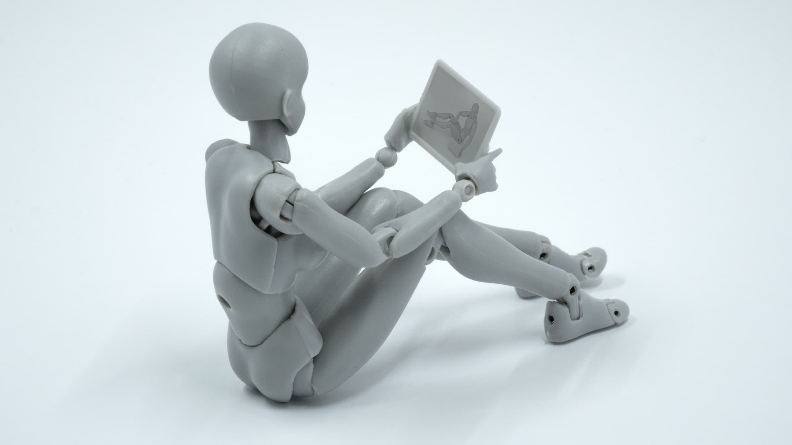 Posture doll sitting