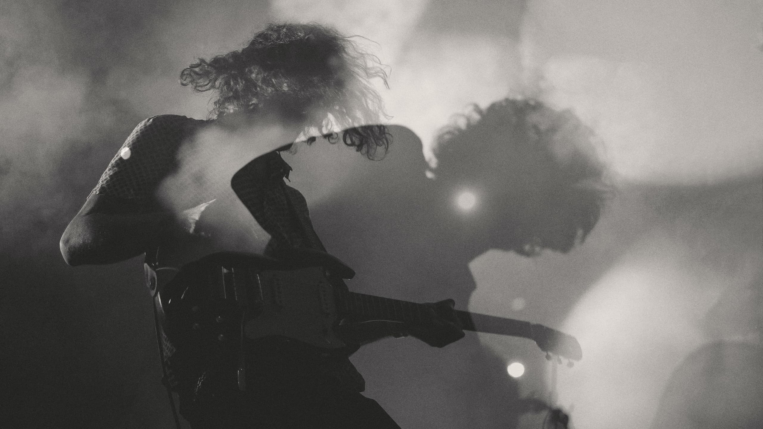 Guitar player on stage performing
