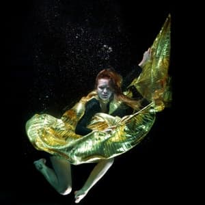 Woman swimming underwater